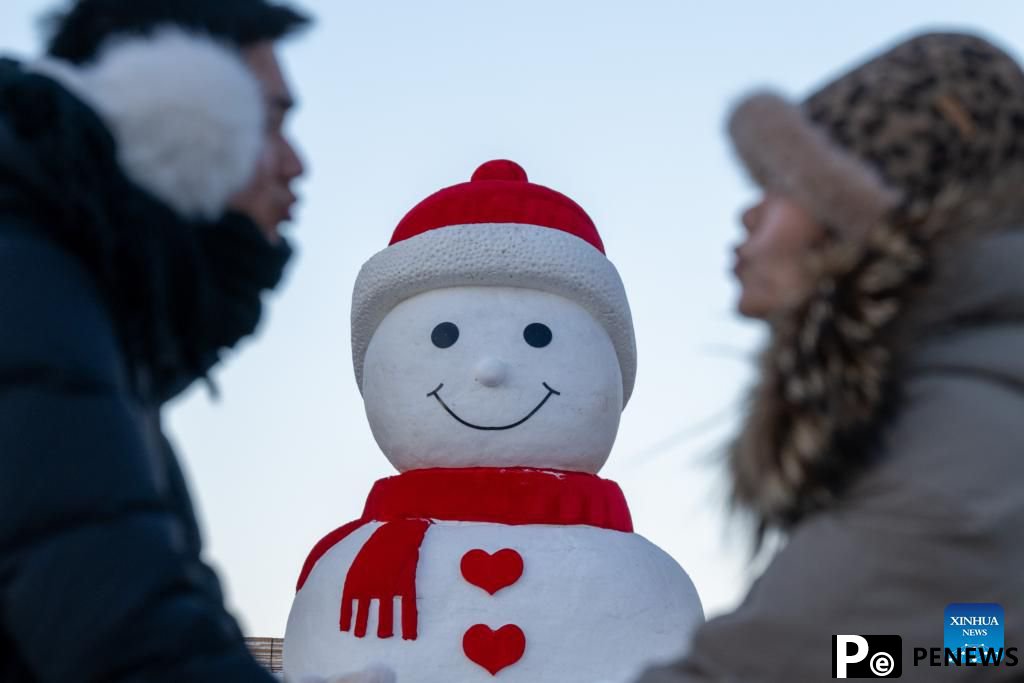 In pics: giant snowman in China
