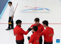 China men's curling team secures berth to play
