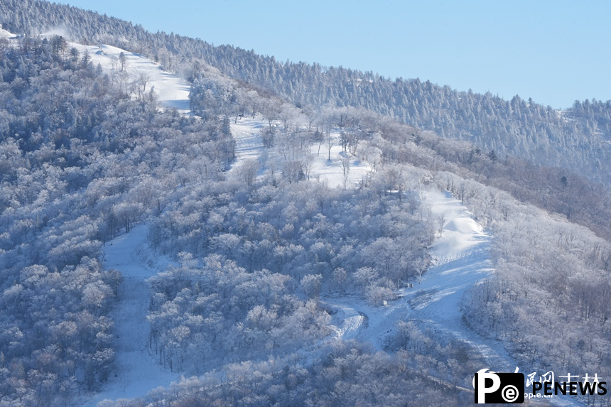 Rime-covered mountains create a scenic wonderland in NE China