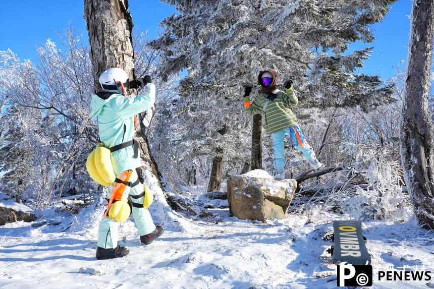 Rime-covered mountains create a scenic wonderland in NE China