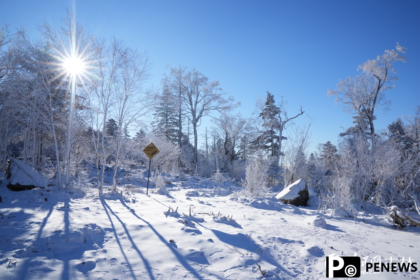 Rime-covered mountains create a scenic wonderland in NE China