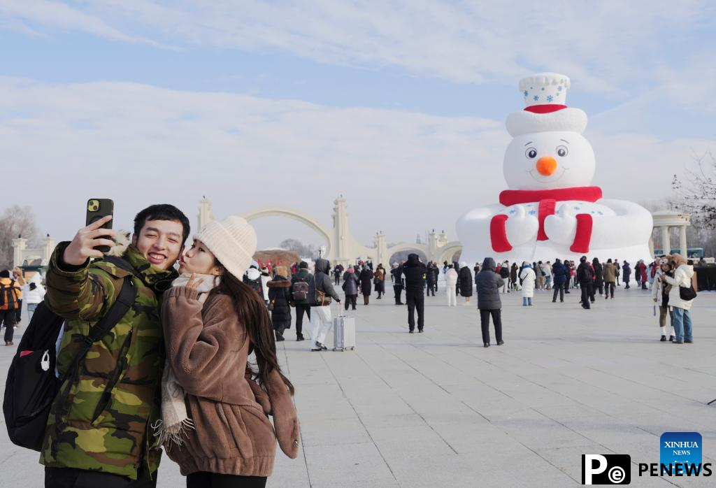In pics: giant snowman at Sun Island scenic spot in Harbin