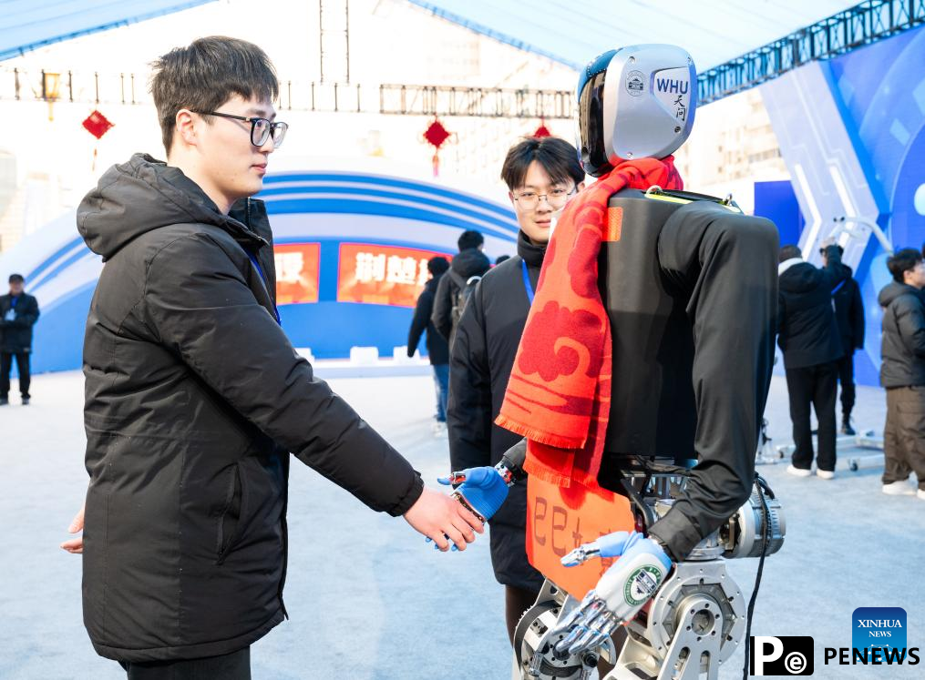 Humanoid robots of ＂Chucai＂ series displayed in Wuhan