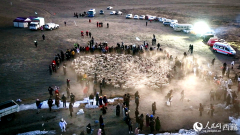Stunning view of sheep herding on ice in SW China's Xizang