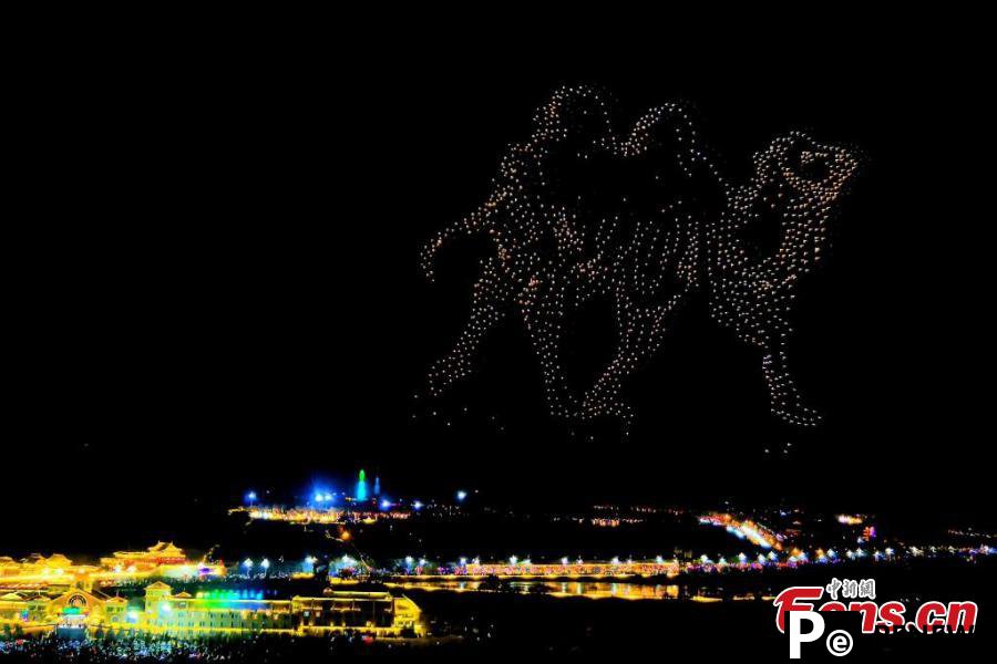 Drone show integrated with pyrotechnic displays creates spectacular nightscape