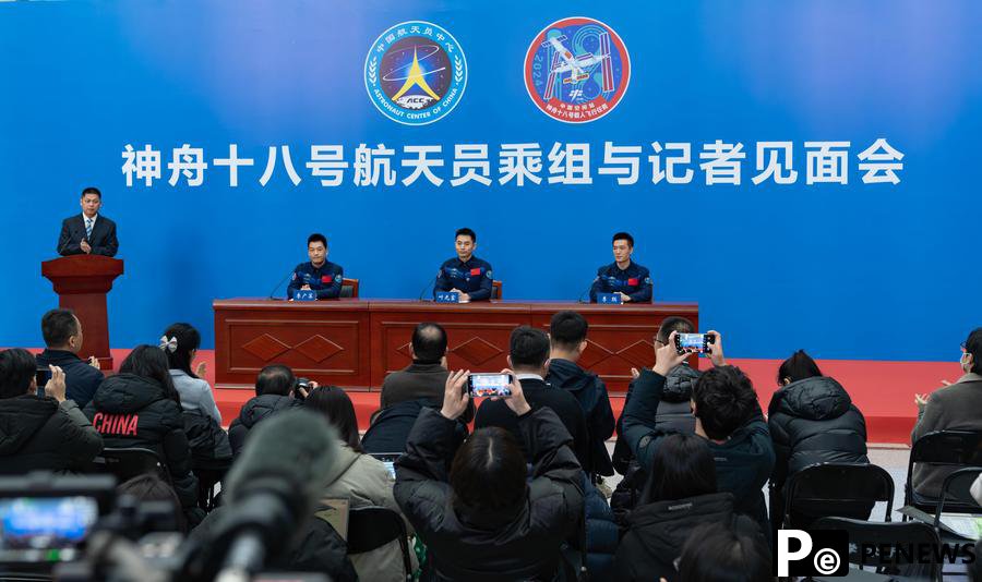 China honors three astronauts with medals