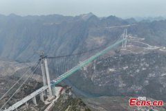 World's tallest bridge connected in Guizhou