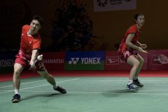 Chinese shuttlers advance to quarters at Indonesia Masters