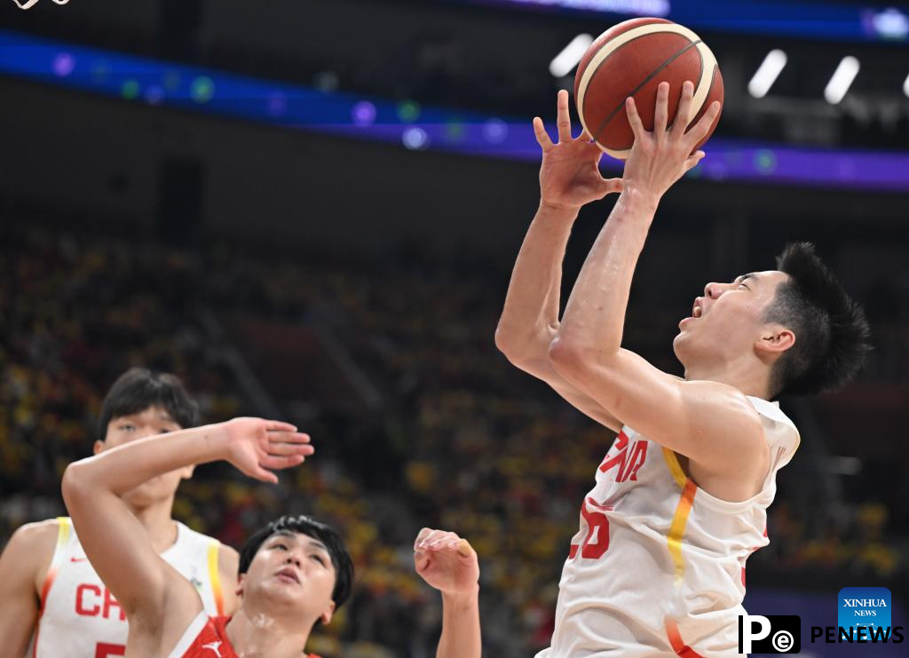 China defeats Japan to secure spot in FIBA Men