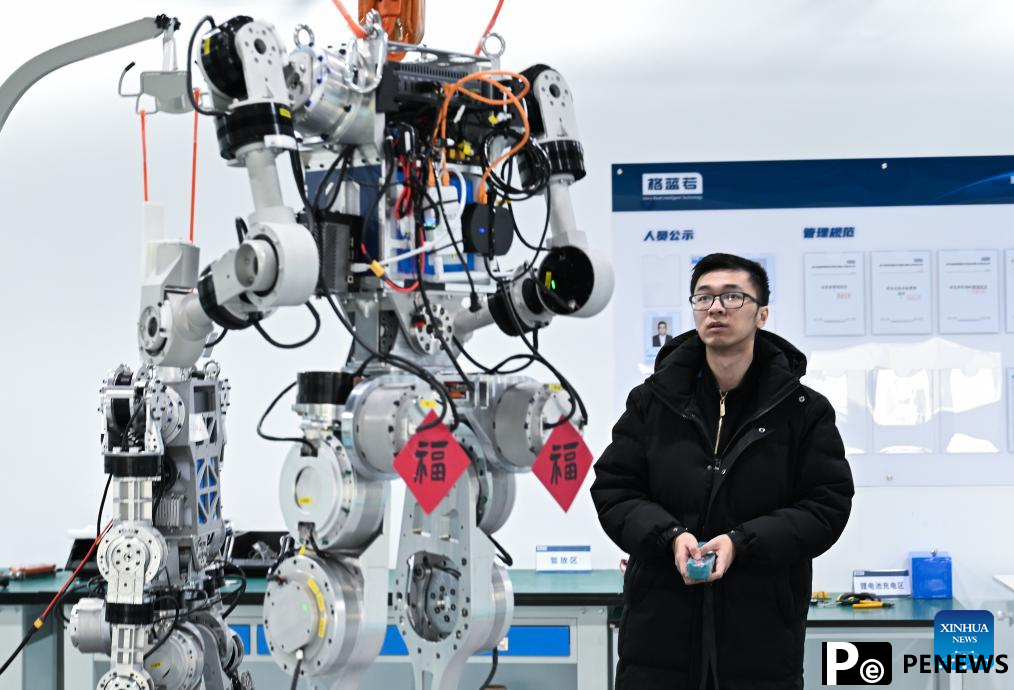 R&D team debugs humanoid robot in Wuhan, China