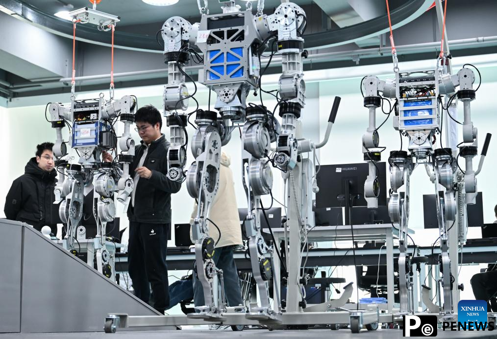 R&D team debugs humanoid robot in Wuhan, China