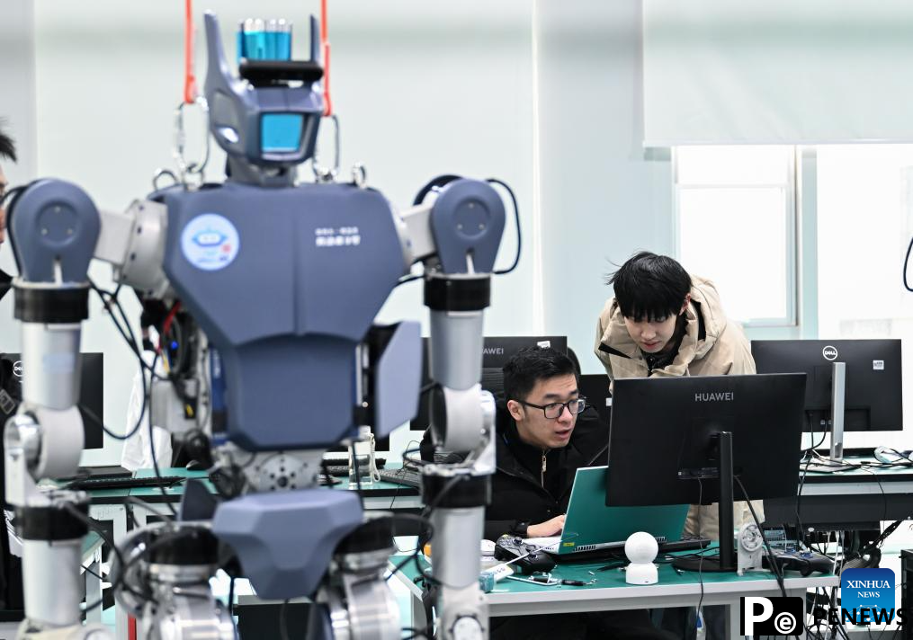 R&D team debugs humanoid robot in Wuhan, China