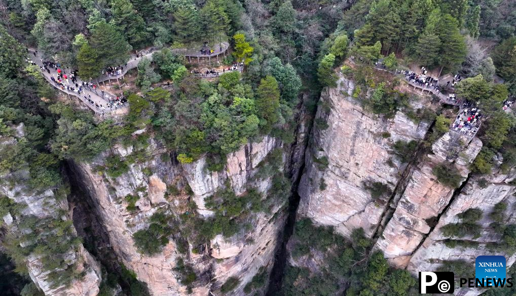 Tourists visit Zhangjiajie National Forest Park in China