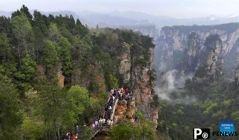 Tourists visit Zhangjiajie National Forest Park in China