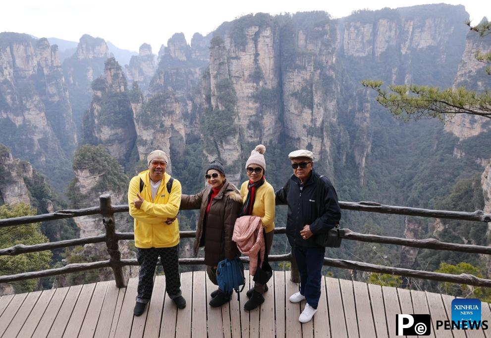 Tourists visit Zhangjiajie National Forest Park in China