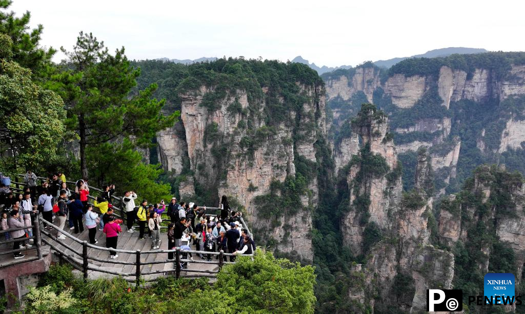 Tourists visit Zhangjiajie National Forest Park in China