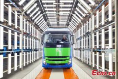 powered heavy trucks roll off production line