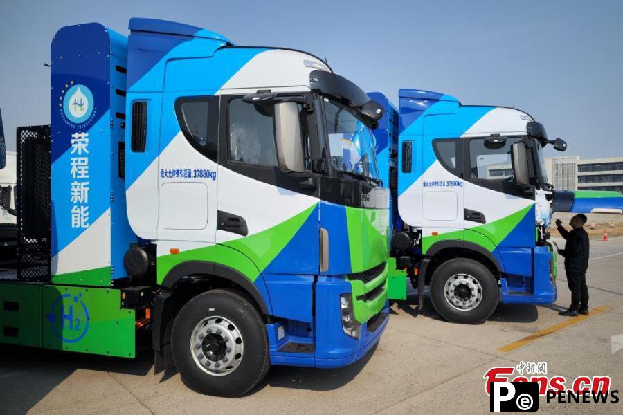 powered heavy trucks roll off production line