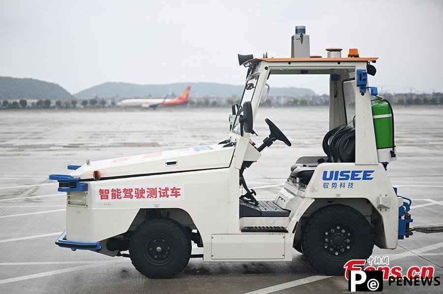 driving cargo tractors complete road test at Hangzhou airport
