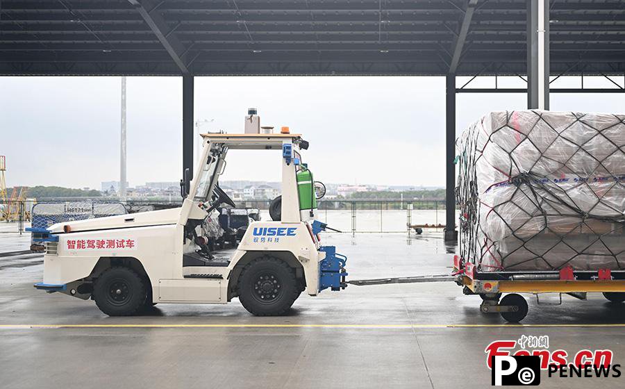 driving cargo tractors complete road test at Hangzhou airport