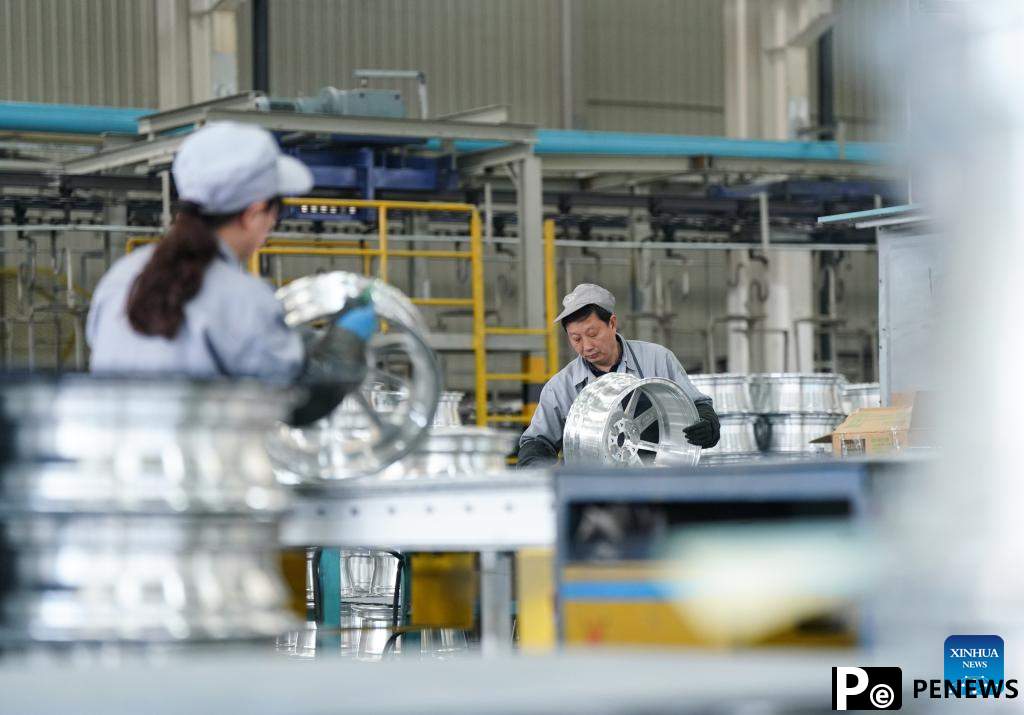 Private enterprises in Linzhou City of Henan operate in full swing
