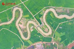 Explore spring vibes of a 36-curve stream in Haikou, S China's Hainan