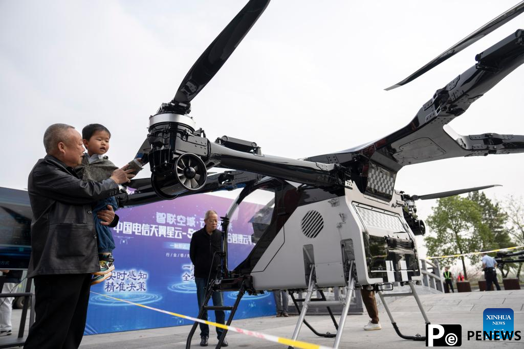 XPENG flying car completes trial flight in central China