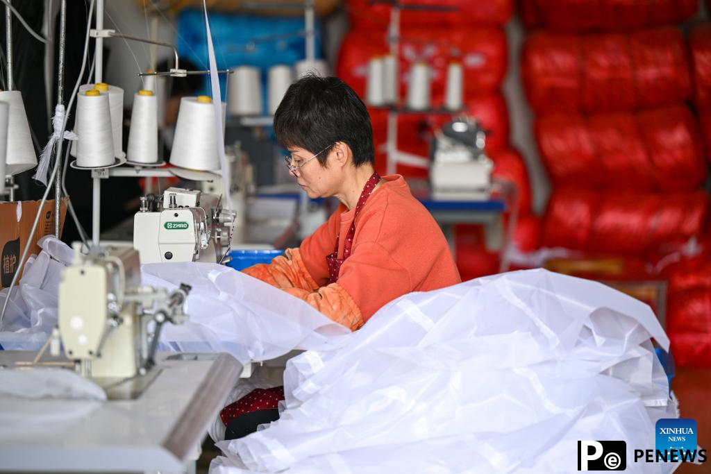 A glimpse of wedding dress industry in Dingji, China