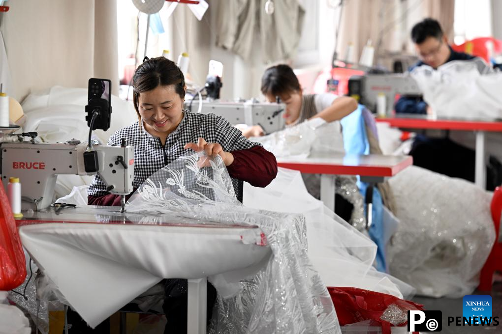 A glimpse of wedding dress industry in Dingji, China