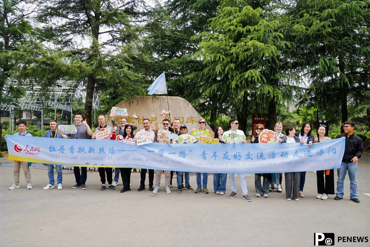 Eurasian journalists tour National Peony Garden in C China