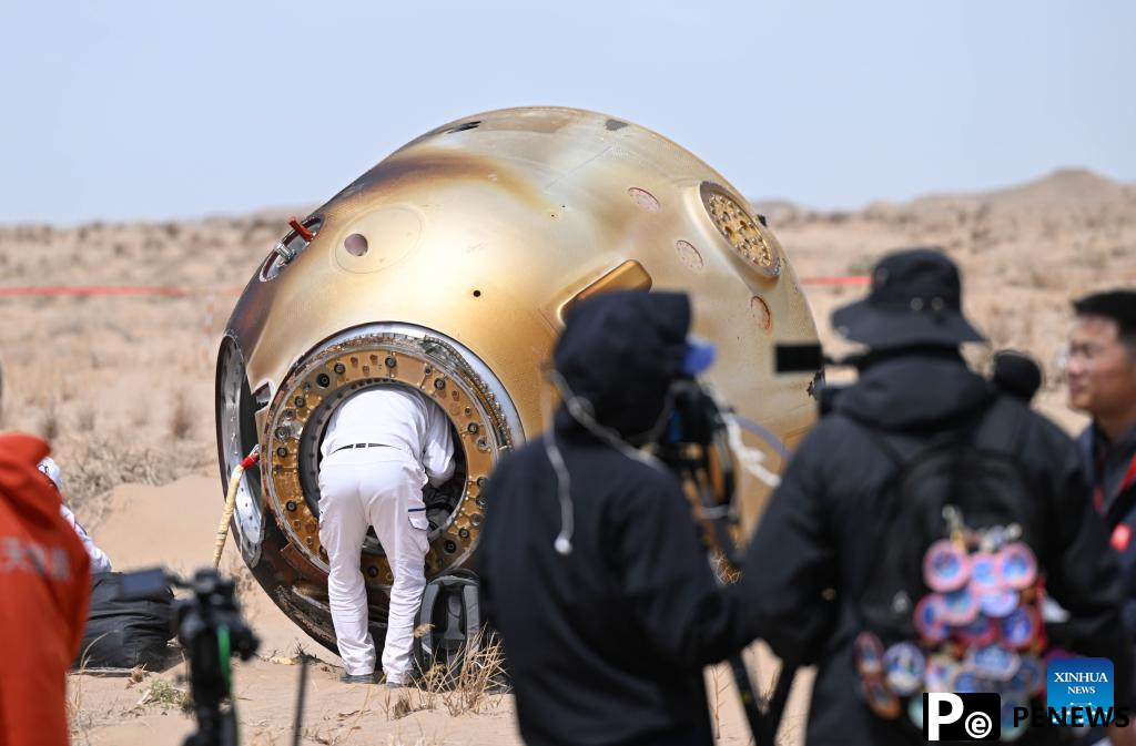 19 return capsule touches down, astronauts all sound
