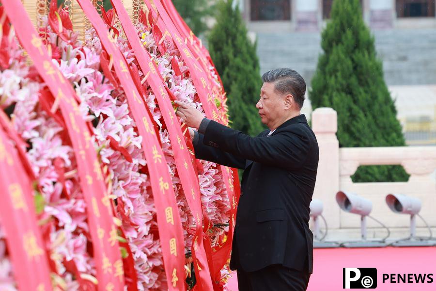 Xi