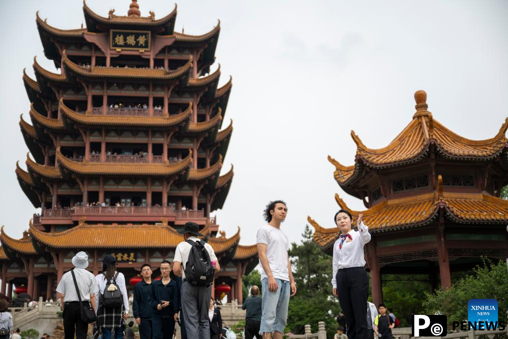 China enhances policies to improve travel and shopping experiences for international visitors