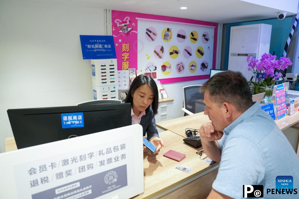 China enhances policies to improve travel and shopping experiences for international visitors