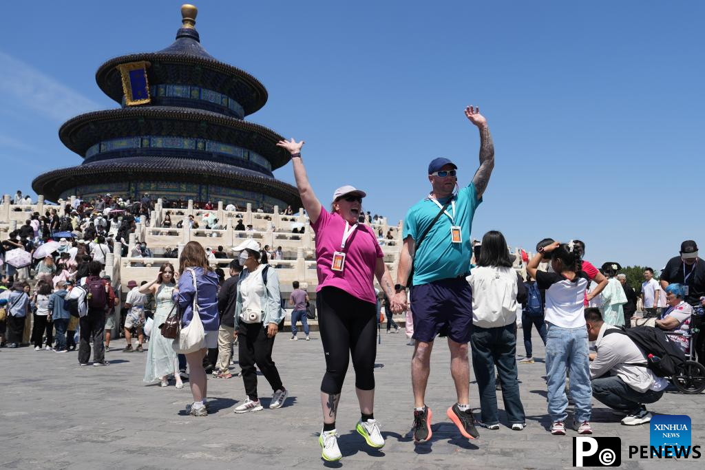 China enhances policies to improve travel and shopping experiences for international visitors