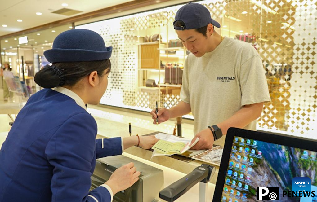 China enhances policies to improve travel and shopping experiences for international visitors