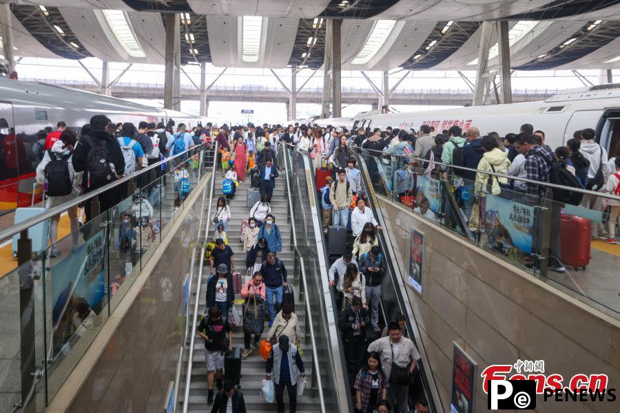 China handles 112 mln railway passenger trips during May Day holiday