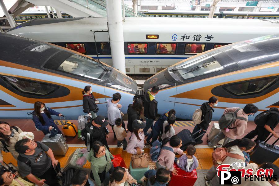 China handles 112 mln railway passenger trips during May Day holiday