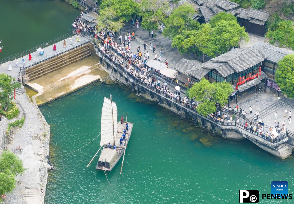 May Day holiday travel boom highlights China