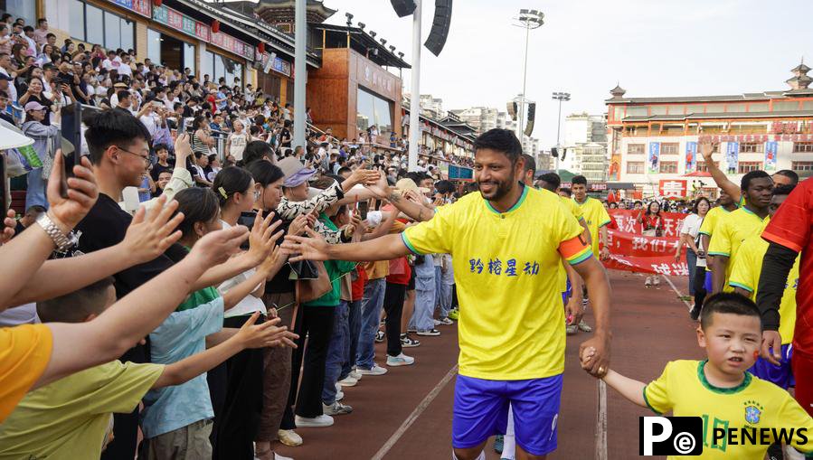 Feature: How grassroots football connects China and Brazil