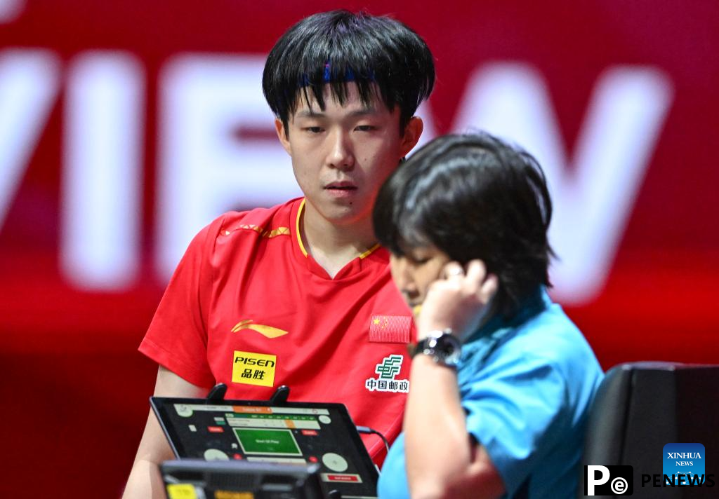 Wang Chuqin reaches fourth round at table tennis worlds
