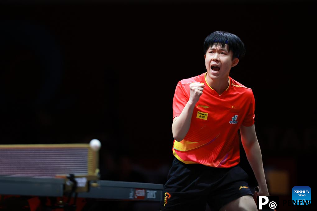 Wang Chuqin reaches fourth round at table tennis worlds