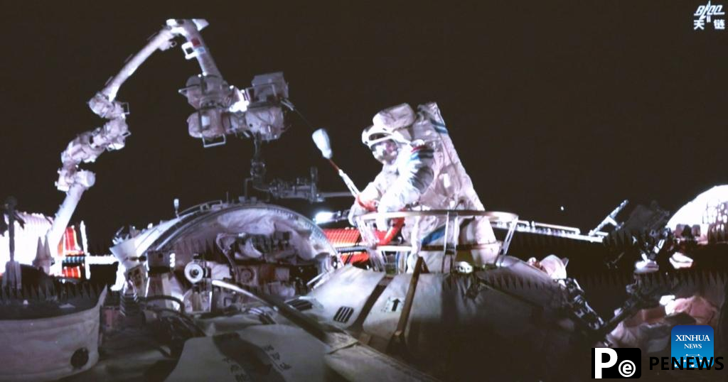 20 astronauts complete first spacewalk