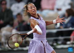 China's Zheng reaches French Open second round
