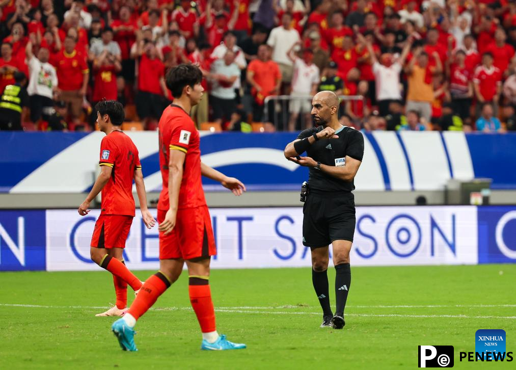 China scores sole goal in penalty against Bahrain to end World Cup qualifying campaign