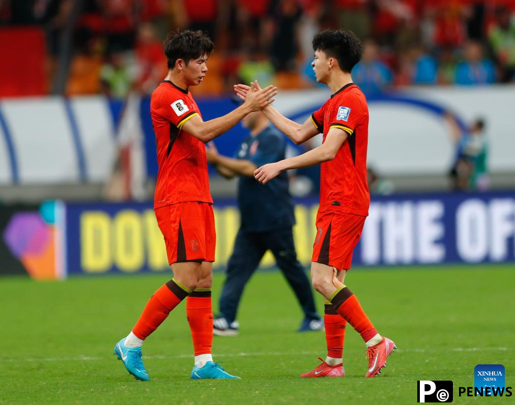 China scores sole goal in penalty against Bahrain to end World Cup qualifying campaign
